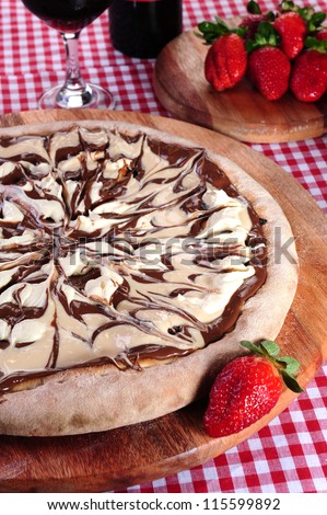 Sweet pizza of white and back chocolate