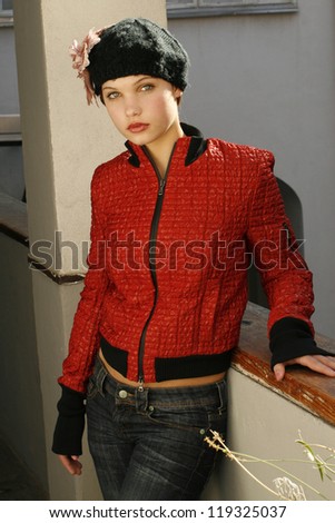 beautiful girl with a beret and red jacket
