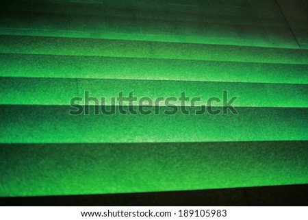 Abstract green decorative light , illuminated green stairs at night , The staircase to success. The Path to success , Abstract green decorative light stairs