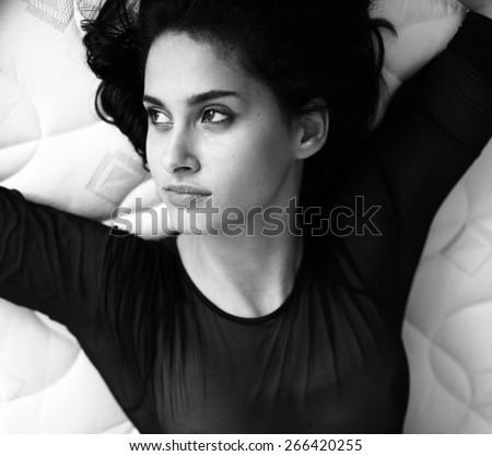 black and white photo of a girl with a black  transparent body