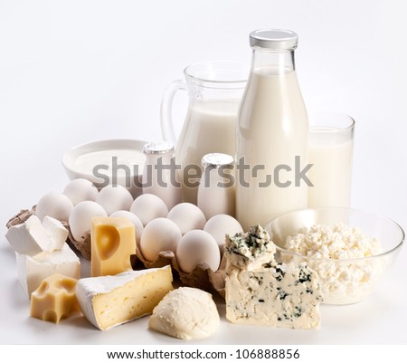 Protein products: cheese, cream, milk, eggs. On a white background.