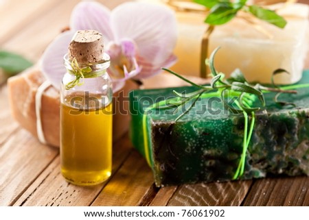 Pieces of natural soap with herbs.