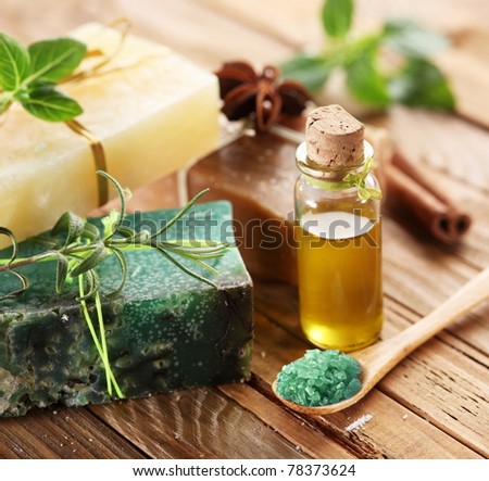 Pieces of natural soap with salt, herbs and oil.