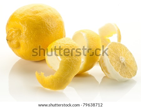 Twist of citrus peel on a white background.
