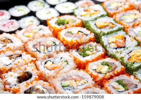 Variety of japanese sushi rolls.