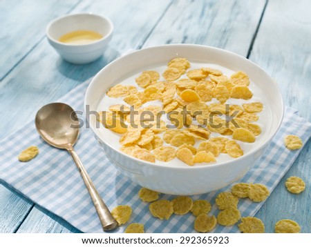 Cornflakes cereal and milk. Morning breakfast.