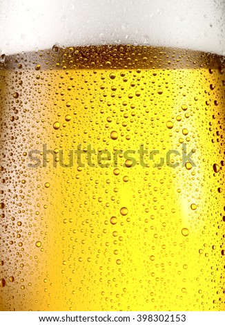 Misted glass of beer. Close up shot.
