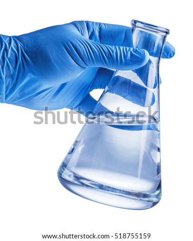 Laboratory beaker in analyst\'s hand in plastic glove. File contains clipping paths.