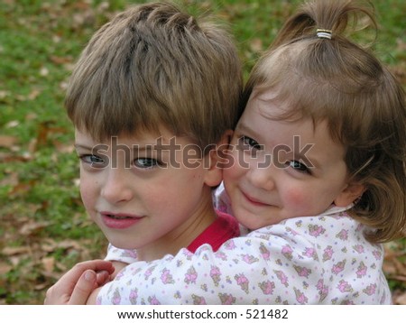 sister hugging brother