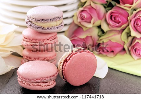 wedding dessert with macaroons and roses