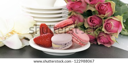 wedding dessert with macaroons and roses, panoramic view
