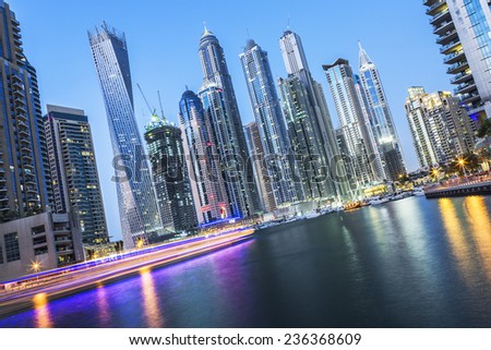 DUBAI, UAE - NOVEMBER 27: Modern buildings in Dubai Marina by night, Dubai, UAE. In the city of artificial channel length of 3 kilometers, taken on 27 November 2014 in Dubai.