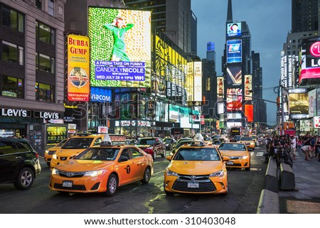 NEW YORK CITY - JULY 10: Taxi on Times Square, an iconic street of New York City and America, July 10, 2015 in Manhattan, New York City. Special photographic processing