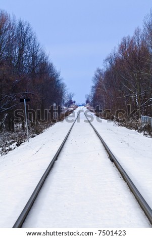 Railway lines winter scene, perspective