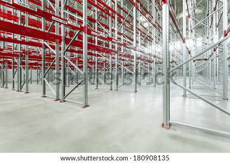 Empty warehouse interior with shelving system