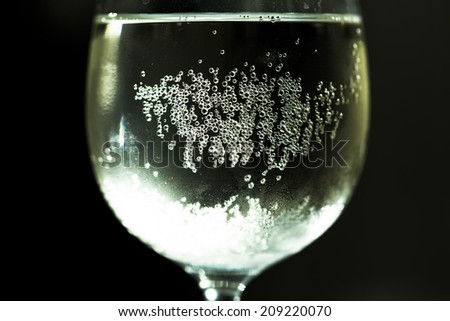 wine with soda, bubbles in the cold humid glass
