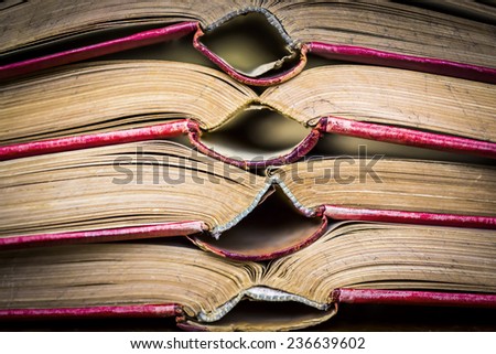 red covered opened old books