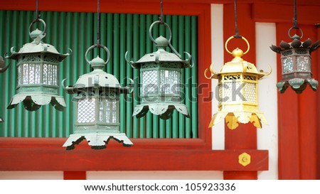 Closeup of bronze lanterns in Kasuga shrine, Nara, Japan