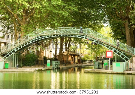 Beautiful pedestrian bridge over the Saint-Martin canal in Paris, France