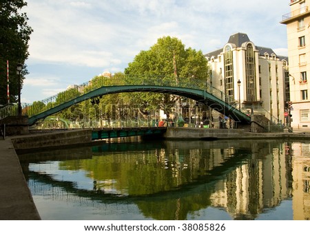 Beautiful pedestrian bridge over the Saint-Martin canal in Paris, France