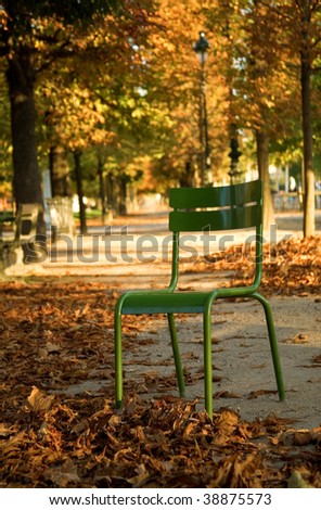 Autumn in Paris. Typical parisian park chair in the Luxembourg Garden. Paris, France