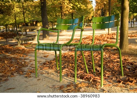 Autumn in Paris. Typical parisian park chairs in the Luxembourg Garden. Paris, France