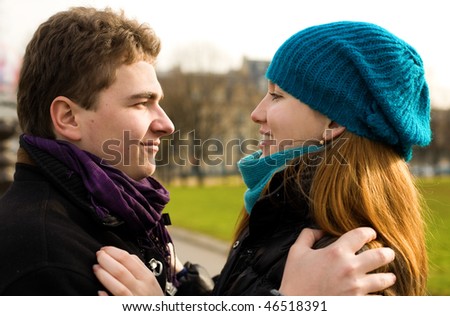 Boyfriend and girlfriend looking into each others eyes