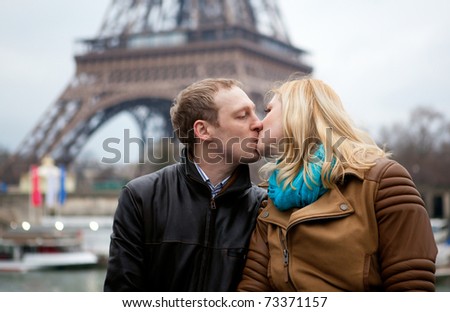 Happy couple in Paris, kissing