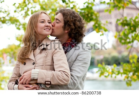 Romantic couple in Paris, kissing