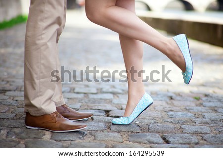 Male And Female Legs During A Date