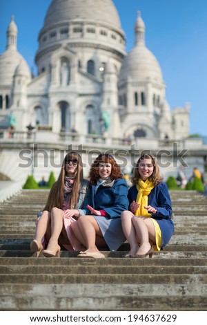 Friends in Paris near the basilica Sacre-Coeur on Montmartre
