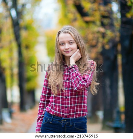 Pretty young girl in a fall park