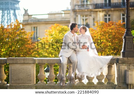 Happy just married couple in Paris on a fall day