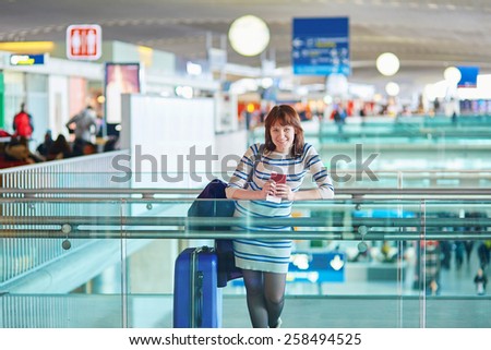 Beautiful young female passenger at the airport