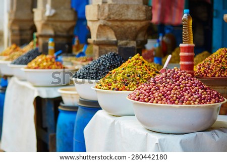 Selection of pickled olives on a traditional Moroccan market (souk) in Essaouira, Morocco