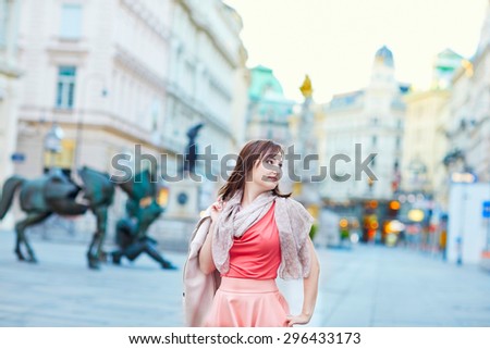 Beautiful young woman walking in Vienna, Austria