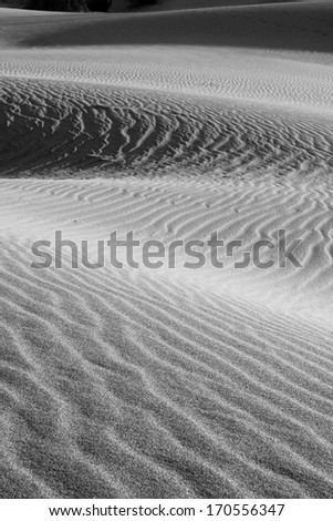 Abstract sand patterns in the Sand Dunes of Mesquite Flats desert, Death Valley, California