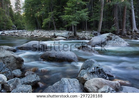 Spring snow melt flowing in the Merced River near Happy Isles, Yosemite National Park, California