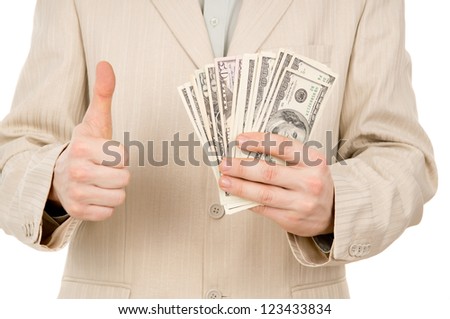 a young man shows that he has is there are us dollars isolated on white background