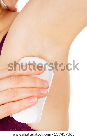 girl to smear armpits at the smell isolated on white background