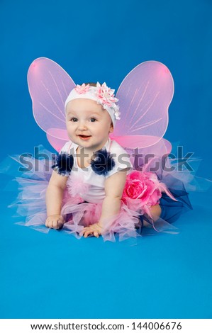 beautiful little fairy on a blue background