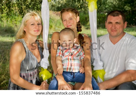 big happy family rest on the nature