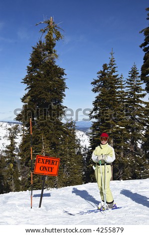 to "Experts only" sign at skiing
