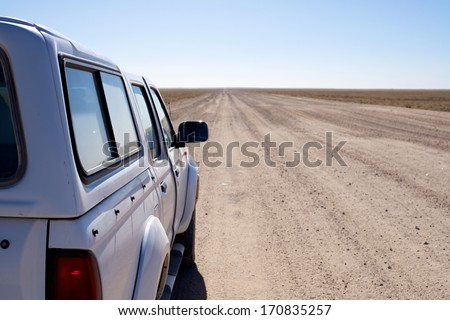 Car on the long road to horizon