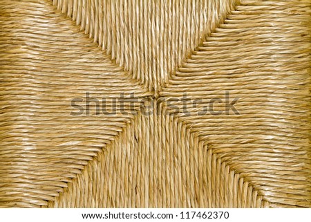 Texture of a traditional handcrafted technic of chair construction made with rattan palm plant by the Portuguese.