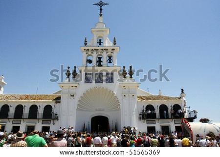 Partial view of the beautiful church of El Rocio in Spain, where a festivity is taking place.