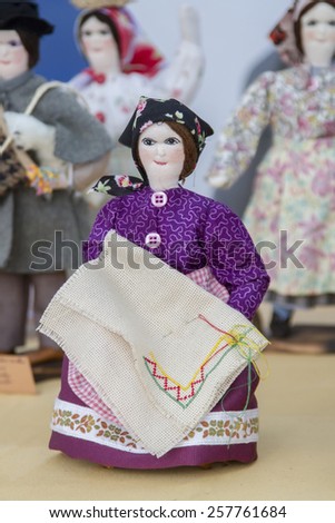 Close up view of beautiful handmade crafted folk dolls of Portuguese culture.