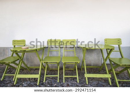 View of typical cafe and restaurant chairs and tables.