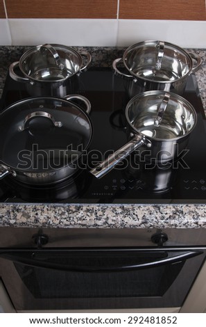 Close up view of an electrical kitchen induction ceramic hob.