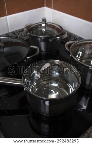Close up view of an electrical kitchen induction ceramic hob.